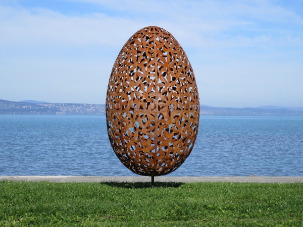 Egg garden sculpture rusty